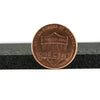 Rubber Acoustic Underlay – Up to 54 dB Impact Noise Insulation 3mm, shown with a penny for scale on textured foam, highlights its slim design for effective soundproofing and acoustic insulation in limited spaces.