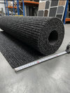 Anthracite polypropylene barrier entrance matting commercial roll — clean cut edge, no black binding, triple-ribbed surface, ready to cut to length