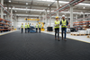 Industrial warehouse with fine ribbed rubber flooring