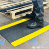 Anti-fatigue mat pebble surface texture close up — 9mm thick PVC foam, black and grey options available
