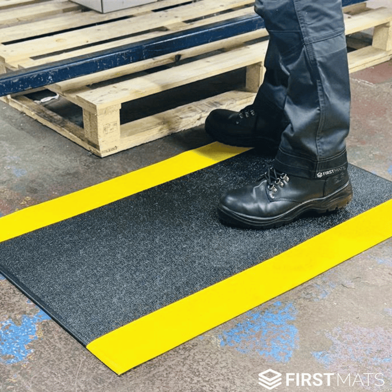 Anti-fatigue mat pebble surface texture close up — 9mm thick PVC foam, black and grey options available
