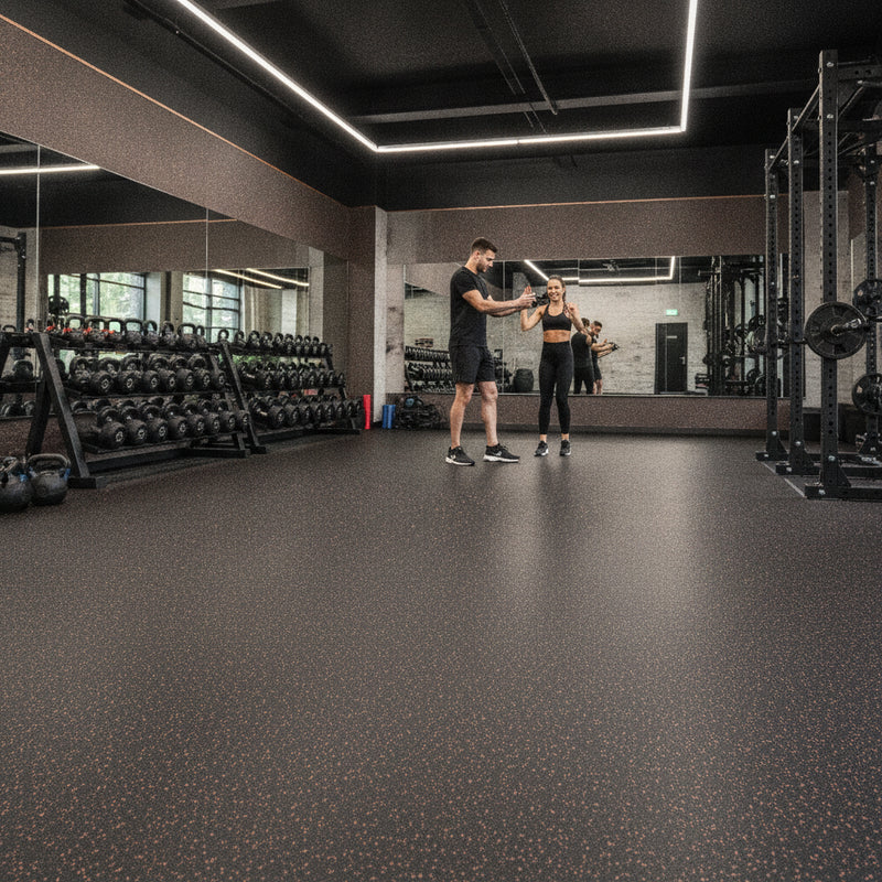 Black rubber gym flooring installed in UK personal training studio — Slip-Not heavy duty matting rolls